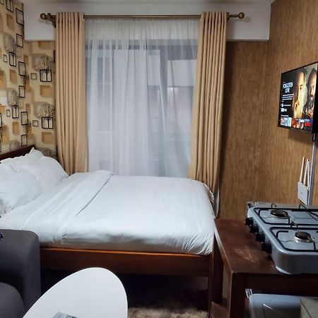 شقة Lovely & Cozy Compact Studio Near Airport With Rooftop View نيروبي المظهر الخارجي الصورة