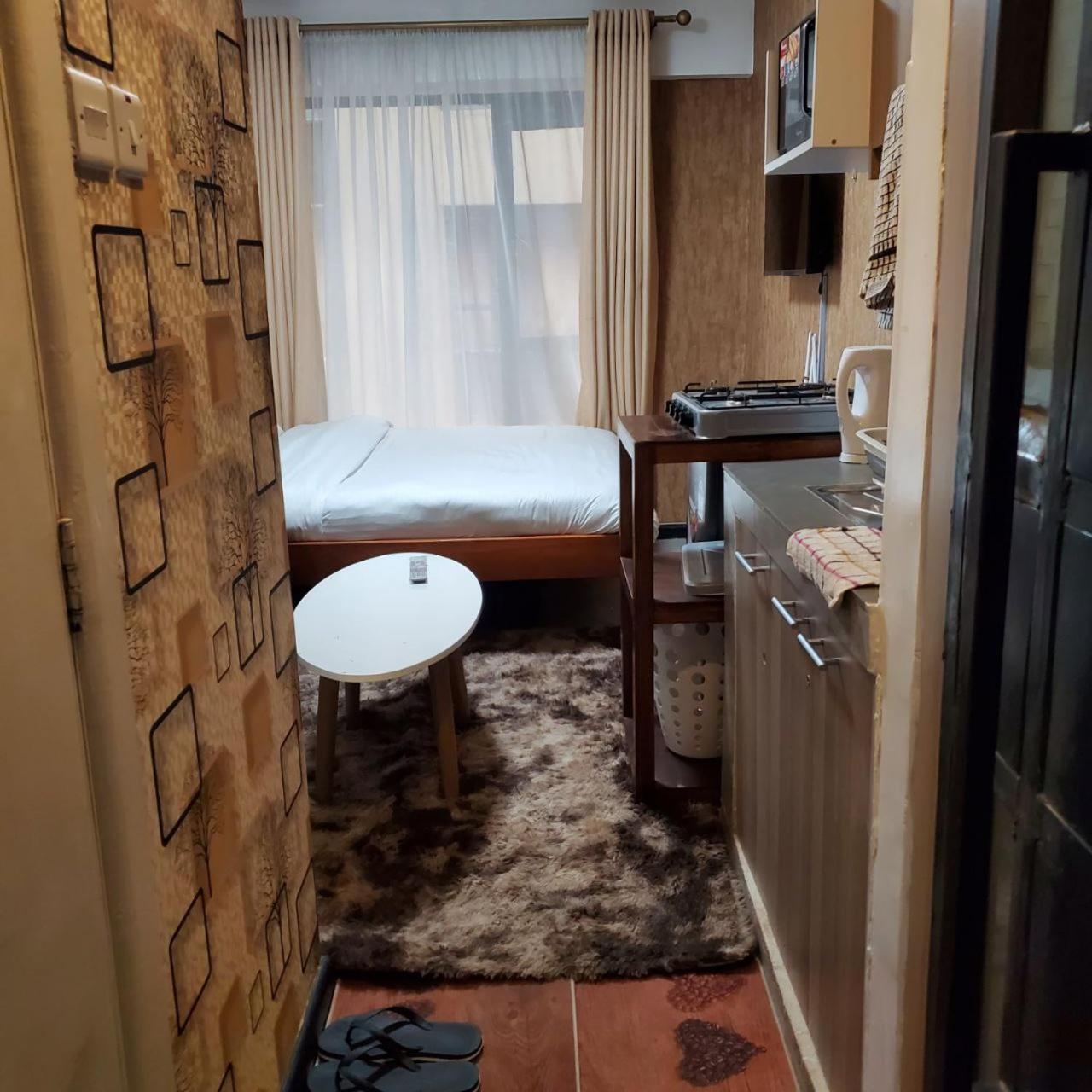 شقة Lovely & Cozy Compact Studio Near Airport With Rooftop View نيروبي المظهر الخارجي الصورة