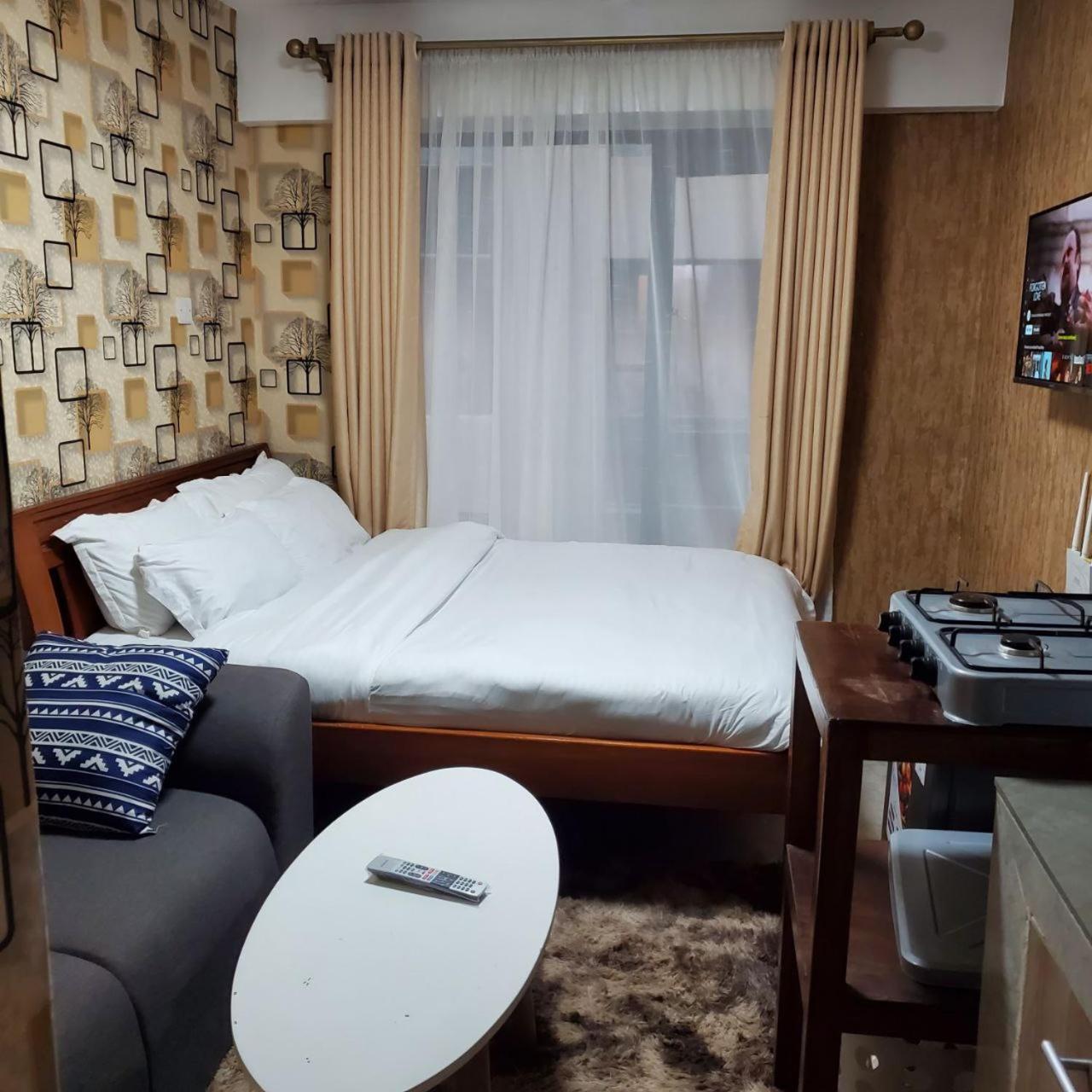 شقة Lovely & Cozy Compact Studio Near Airport With Rooftop View نيروبي المظهر الخارجي الصورة