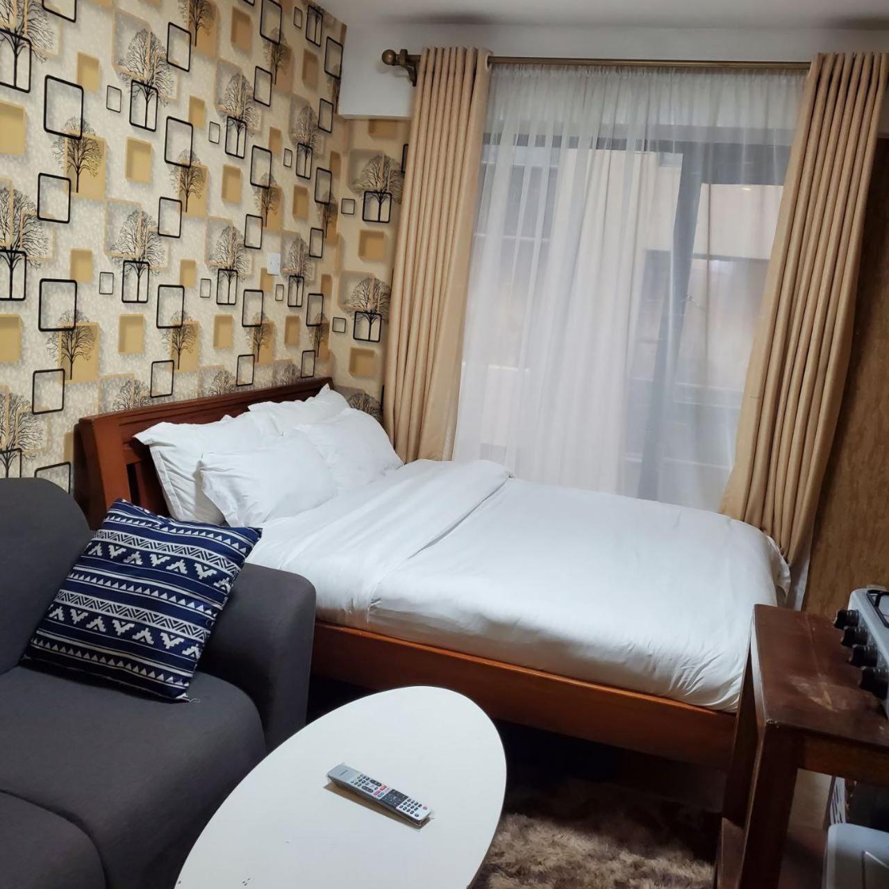 شقة Lovely & Cozy Compact Studio Near Airport With Rooftop View نيروبي المظهر الخارجي الصورة